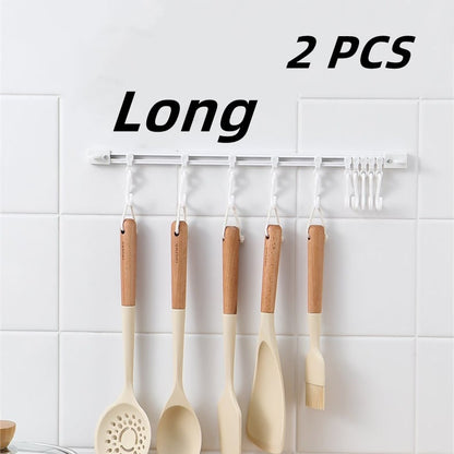 🧺Köp 1 få 1 gratis🔥! S‑formad vägghängare utan borrning – justerbara krokar, slagfri montering & mångsidig förvaring – perfekt för kök, badrum och hall 🏠✨