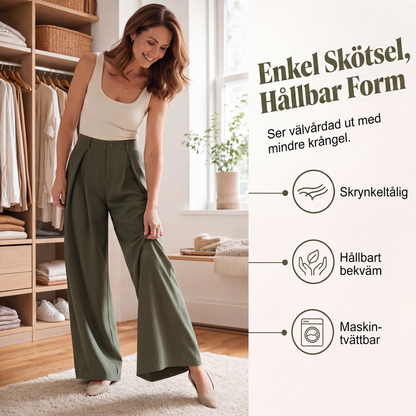 Högmidjade veckade vidbensbyxor för dam